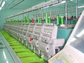 Xưởng may - Mỏy múc