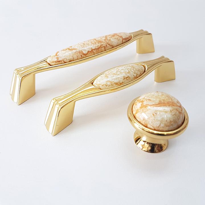 Tay nắm cửa tủ