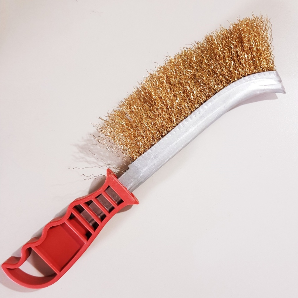 Bàn chải thép cán nhựa đỏ