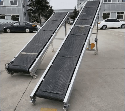 Băng tải nâng hạ lên ô tô, Container