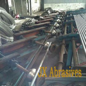 Máy phun bi dạng băng truyền con lăn