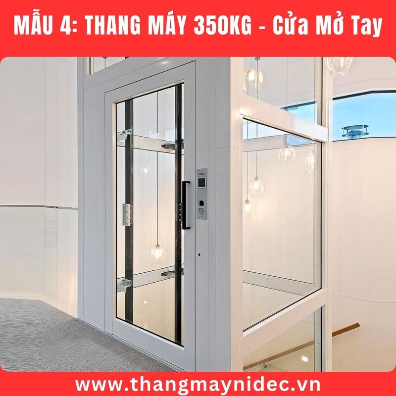 Thang máy 350kg cửa mở tay