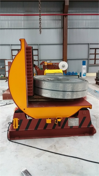 Máy lật cuộn