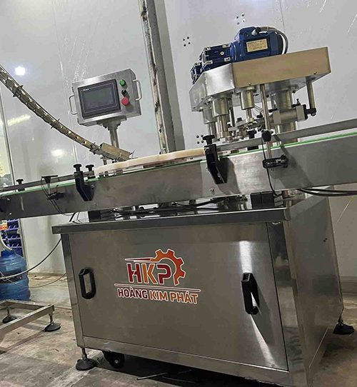 Máy bo viền nắp nhôm
