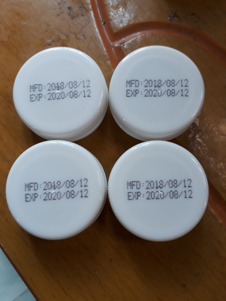 Nắp chai dập date