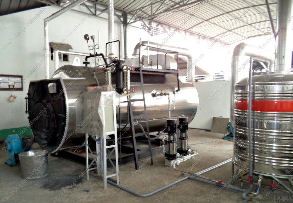 Nồi hơi đốt mùn cưa ép
