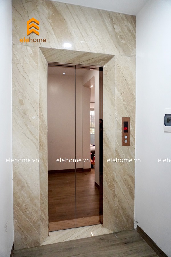 Thang máy gia đình mẫu inox gương hồng