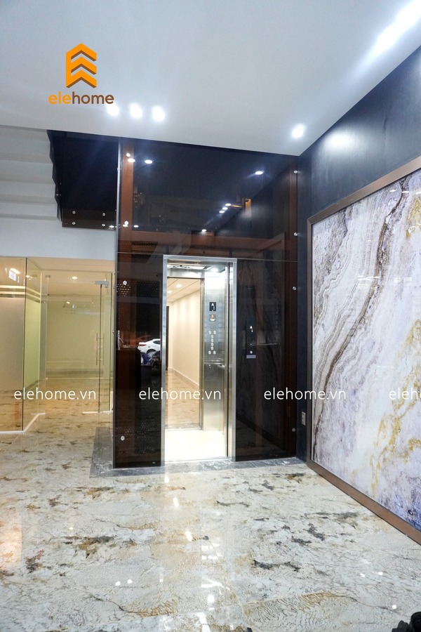 Thang máy gia đình mẫu kính 2 cửa đối diện